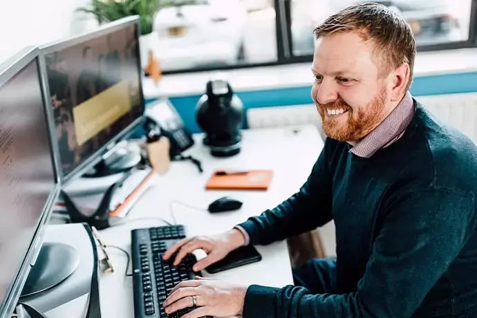 Phil-At-Desk-Accounts-min